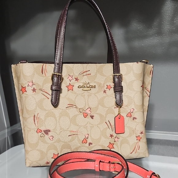 Coach Handbags - COACH EUC STARS AND HEARTS Tan and Brown Signature Canvas Crossbody